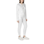 EA7 Emporio Armani cream polyester tracksuit laid flat, showing jacket and matching pants with subtle branding and sporty design.