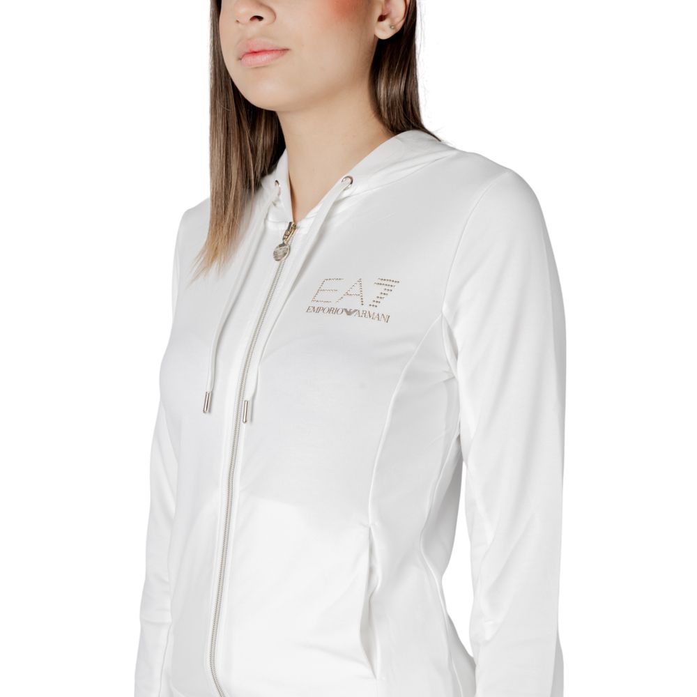 EA7 Emporio Armani cream polyester tracksuit laid flat, showing the full zip-up jacket and matching pants with logo accents.