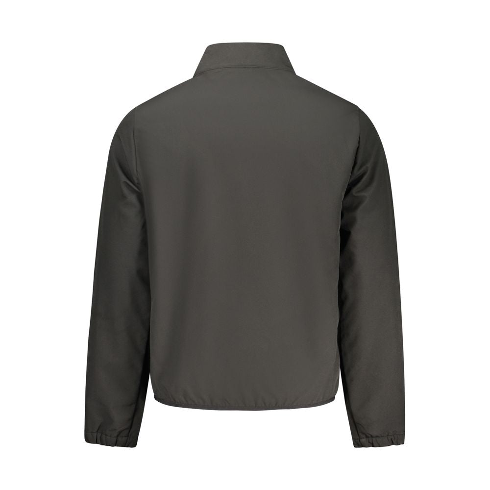 Norway 1963 black polyester men's jacket with a stand collar and front zipper, shown on a hanger.