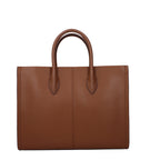 Michael Kors brown leather handbag with gold-tone hardware and adjustable shoulder strap, featuring a spacious interior and stylish design.