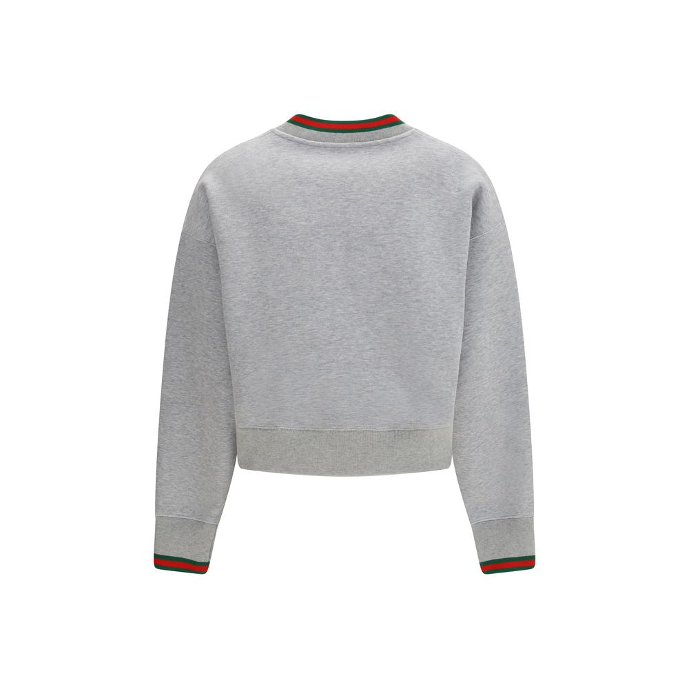 Gucci gray cotton sweatshirt with a relaxed fit, featuring the brand's logo on the front and ribbed cuffs and hem.