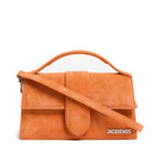 Jacquemus Terracotta leather Le Grand Bambino handbag with top handle and minimalist design, showcasing smooth leather and structured shape.