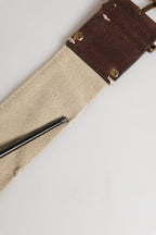 Beige and brown leather canvas belt with metal buckle from Ermanno Scervino, displayed on a neutral background.