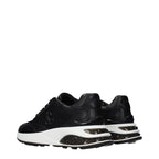 Jimmy Choo black fabric athletic sneakers with sleek design and lace-up closure, ideal for casual and active wear.