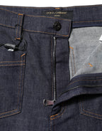 Dark blue cotton denim jeans with flared wide-leg fit from Dolce & Gabbana, shown on a model.