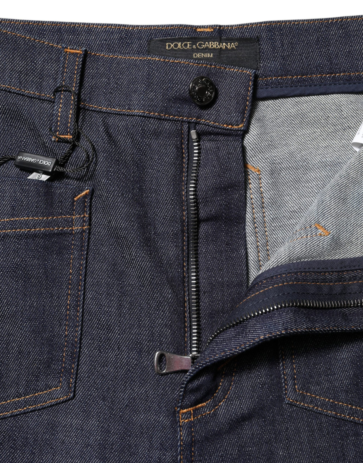 Dark blue cotton denim jeans with flared wide-leg fit from Dolce & Gabbana, shown on a model.