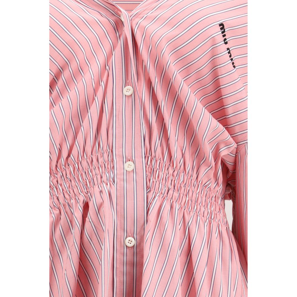 Multicolor cotton casual dress by Miu Miu featuring a relaxed fit and vibrant pattern, perfect for everyday wear.