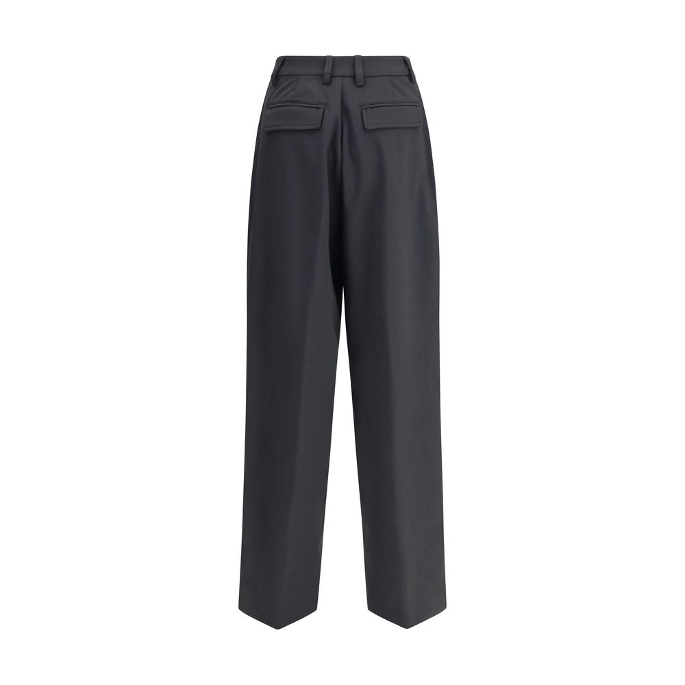 Black polyester casual pants from The Latest, featuring a relaxed fit and modern style for everyday wear.