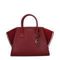 Red leather Michael Kors handbag with gold-tone hardware and adjustable strap, showcasing a sleek, stylish design.