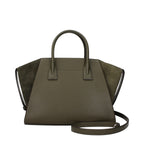 Michael Kors green leather handbag with top handles and gold-tone hardware, stylish and spacious for everyday use.