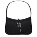 Black leather Michael Kors handbag with gold-tone hardware and structured design, featuring top handles and a sleek, stylish appearance.