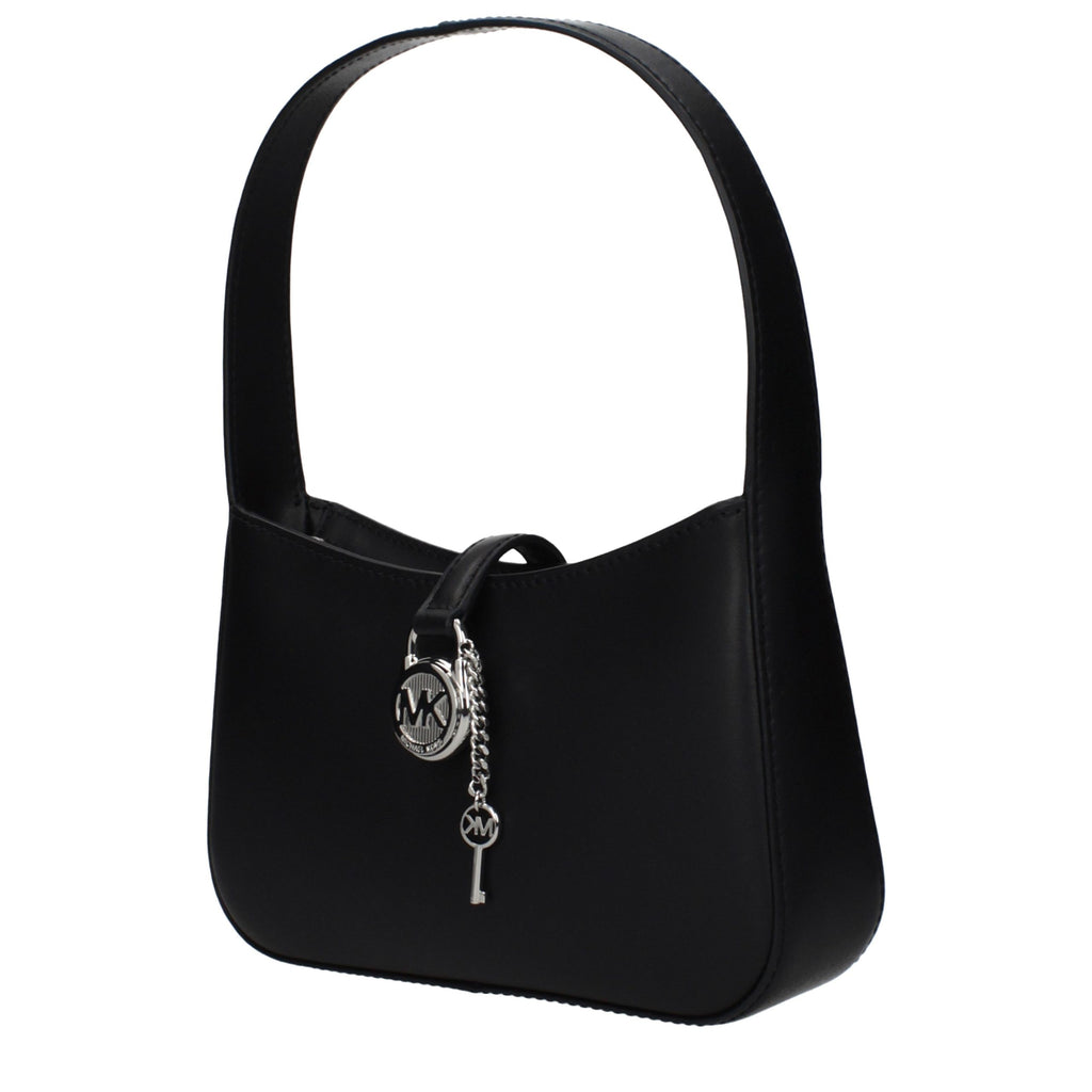 Black leather Michael Kors handbag with gold accents and structured design, featuring double top handles and a sleek, stylish appearance.