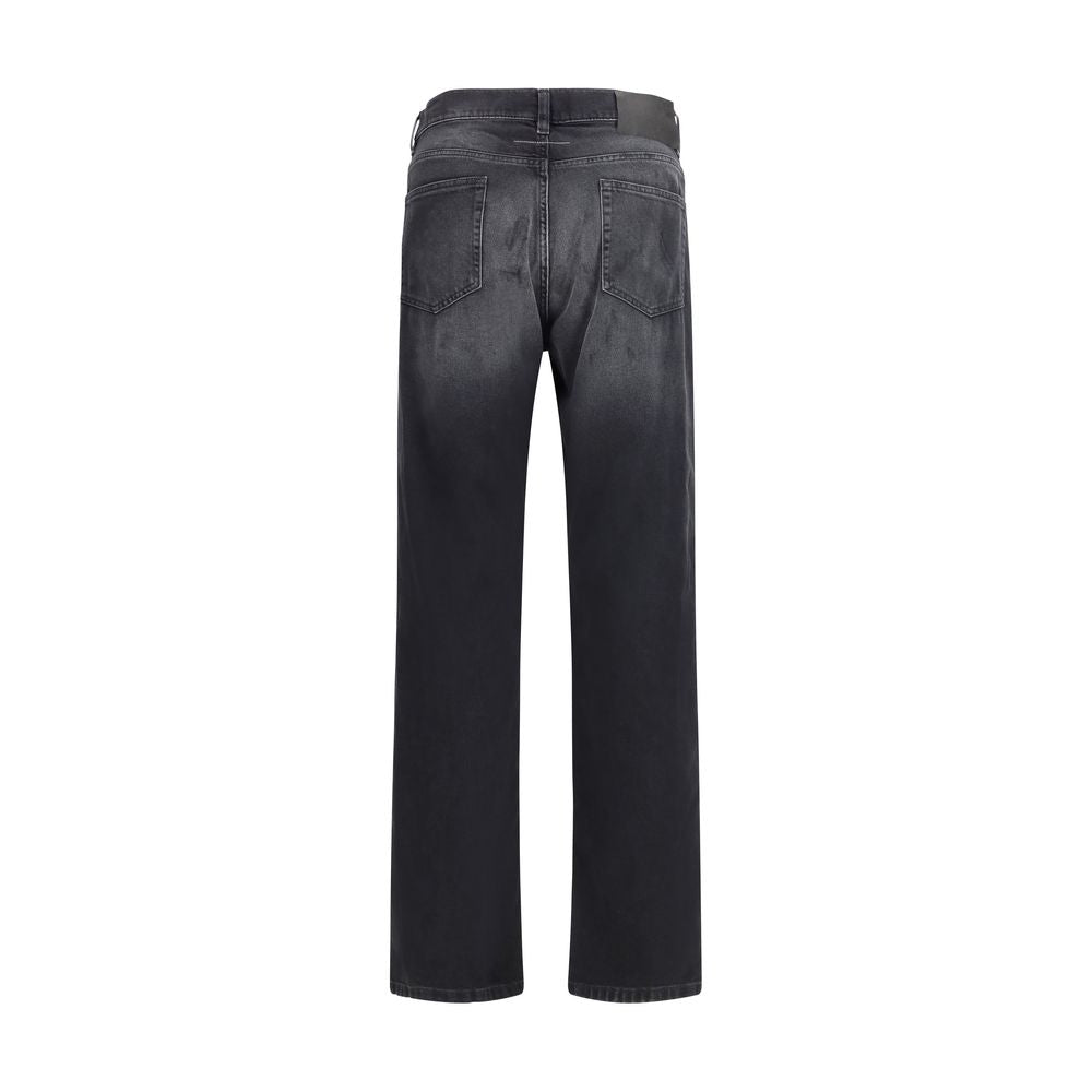 Black cotton straight-leg jeans by MM6, showcasing a classic fit with belt loops, front pockets, and a sleek, minimalist design.