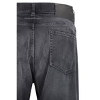 MM6 black cotton straight-leg jeans displayed on a hanger with a minimalist background.
