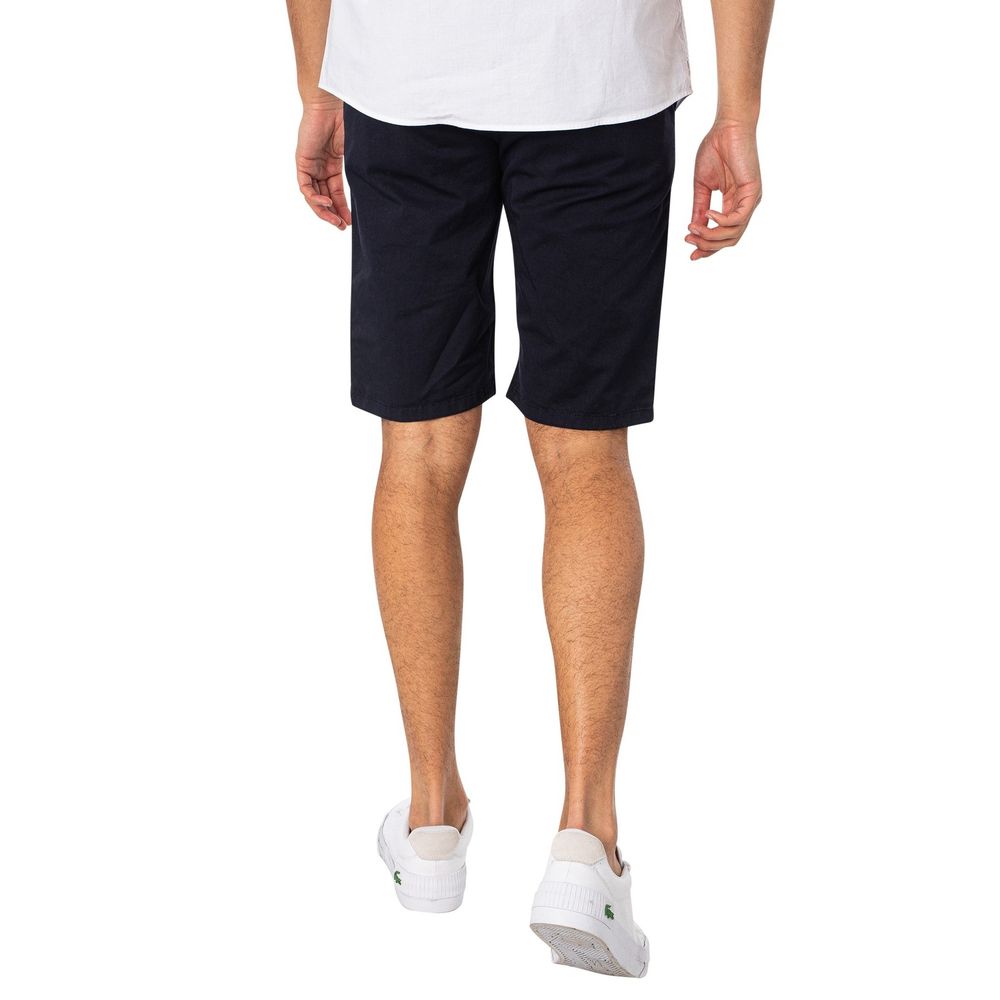 Blue cotton Bermuda shorts by Lyle & Scott laid flat showing the waistband and classic design.