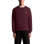 Lyle & Scott Bordeaux cotton sweatshirt featuring a crew neck and ribbed cuffs, displayed on a hanger.
