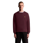 Lyle & Scott Bordeaux cotton sweatshirt with crew neck and long sleeves, featuring the brand's iconic eagle logo on the chest.