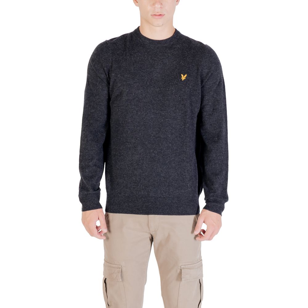 Black nylon sweatshirt from Lyle & Scott featuring a classic crewneck and subtle branding, displayed on a plain background.
