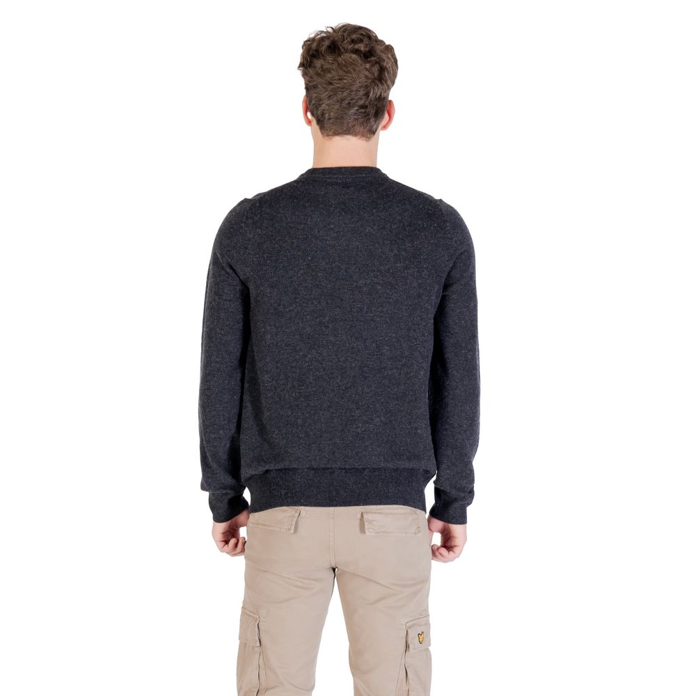 Black nylon sweatshirt from Lyle & Scott featuring a relaxed fit and subtle branding, shown on a neutral background.