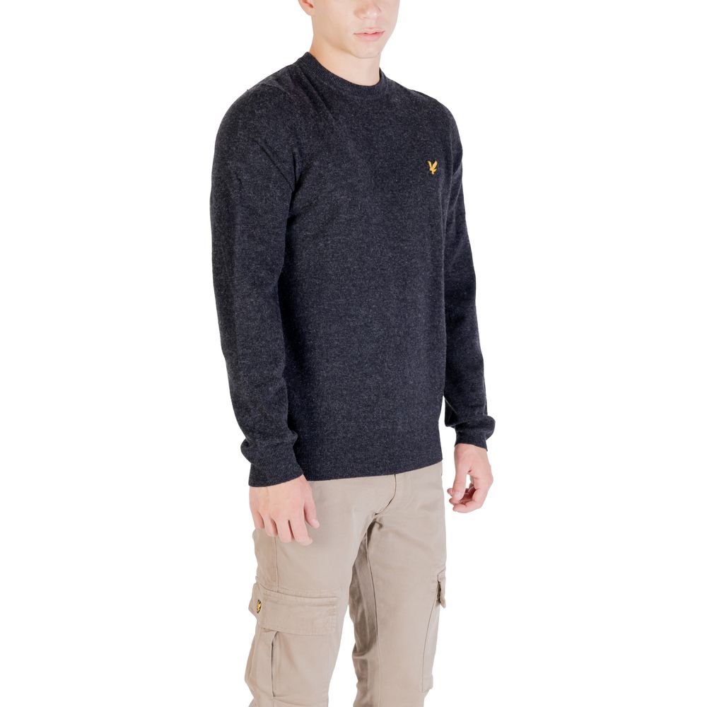 Black nylon sweatshirt by Lyle & Scott with a relaxed fit and subtle branding, shown on a model.