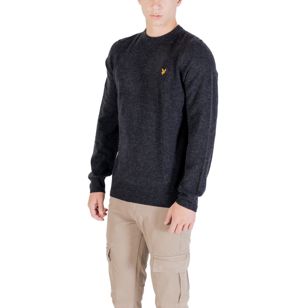 Black nylon sweatshirt by Lyle & Scott with a crew neck and long sleeves, showing a smooth fabric and subtle branding detail.