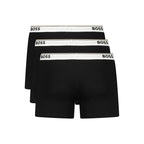 Hugo Boss black cotton men's boxer shorts with elastic waistband and branding, displayed flat on a white background.