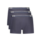 Blue cotton men's boxer shorts by Hugo Boss, close-up view showing comfortable waistband and smooth fabric.