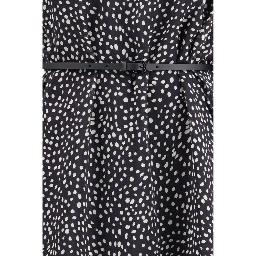 Max Mara black silk casual dress displayed on a hanger, showcasing its elegant, smooth fabric and simple, stylish design.