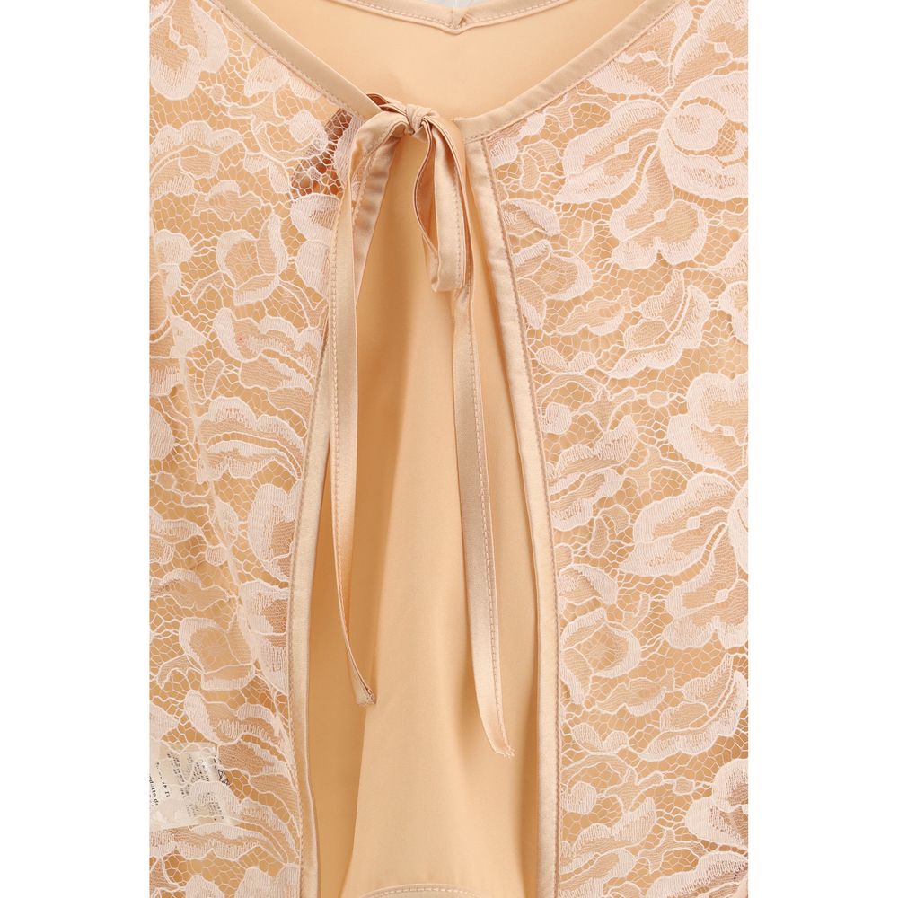 Kristina Ti orange silk blouse with long sleeves and elegant design, perfect for stylish casual or formal wear.