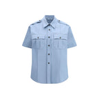 Prada blue cotton shortsleeve shirt displayed on a hanger, showcasing a casual, stylish men's top with a classic collar and short sleeves.