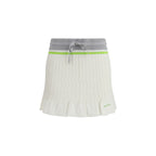 Casablanca white cotton mini skirt with a fitted waist and clean design, shown on a mannequin.