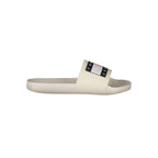 Tommy Hilfiger beige polyurethane men's slipper with slip-on design and cushioned sole, suitable for indoor wear.
