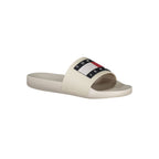 Beige Tommy Hilfiger men's slipper made of polyurethane with a comfortable slip-on design and brand logo details.