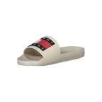 Tommy Hilfiger beige polyurethane men's slipper with slip-on design and cushioned sole, ideal for casual indoor wear.