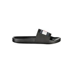 Tommy Hilfiger black polyurethane men's slipper with slip-on design and cushioned sole, ideal for casual wear.