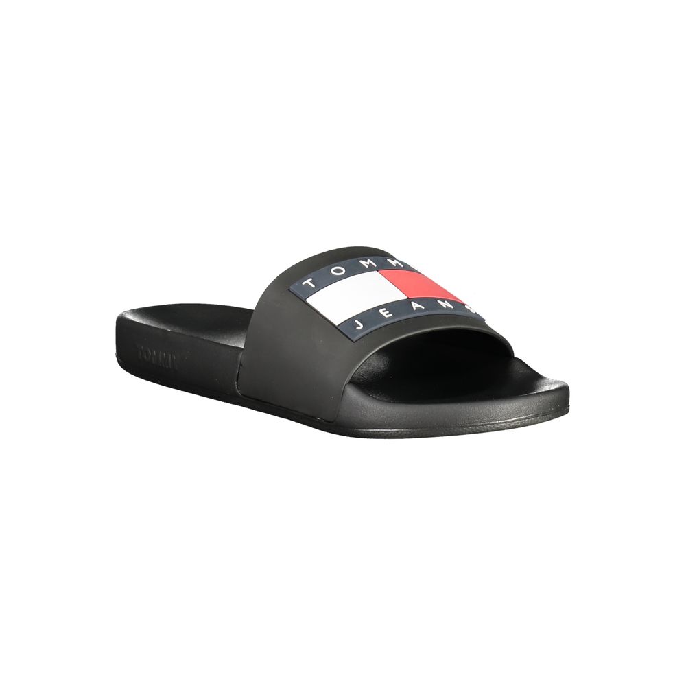 Tommy Hilfiger black polyurethane men's slippers with slip-on design and cushioned insoles, suitable for casual wear.