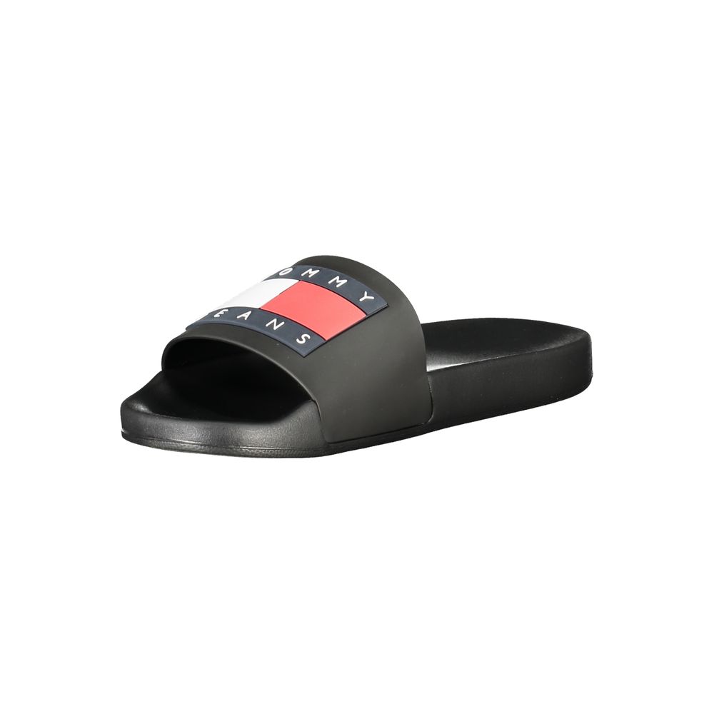 Tommy Hilfiger black polyurethane men's slipper with slip-on design and casual style, suitable for indoor and outdoor wear.
