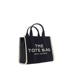 Black cotton Marc Jacobs handbag with sleek design and subtle branding, featuring handles and spacious interior.
