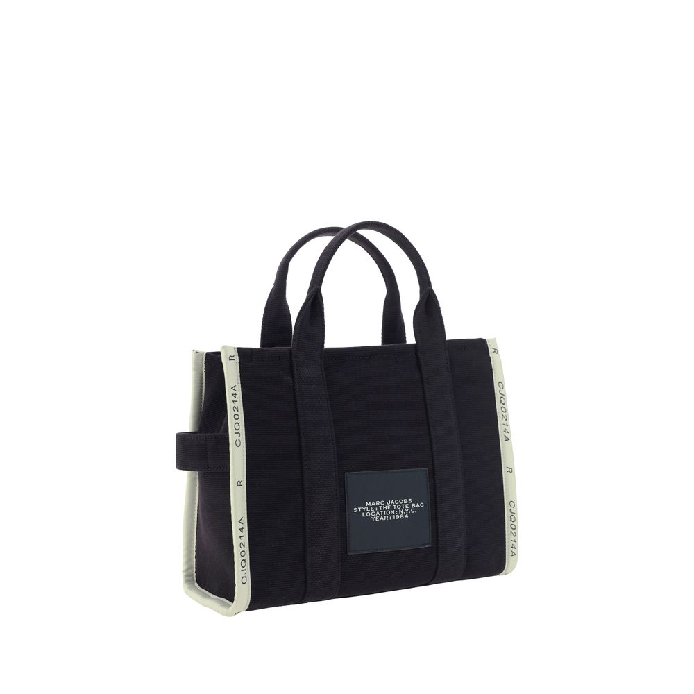 Black cotton handbag by Marc Jacobs with silver hardware, featuring a sleek design and top handles.