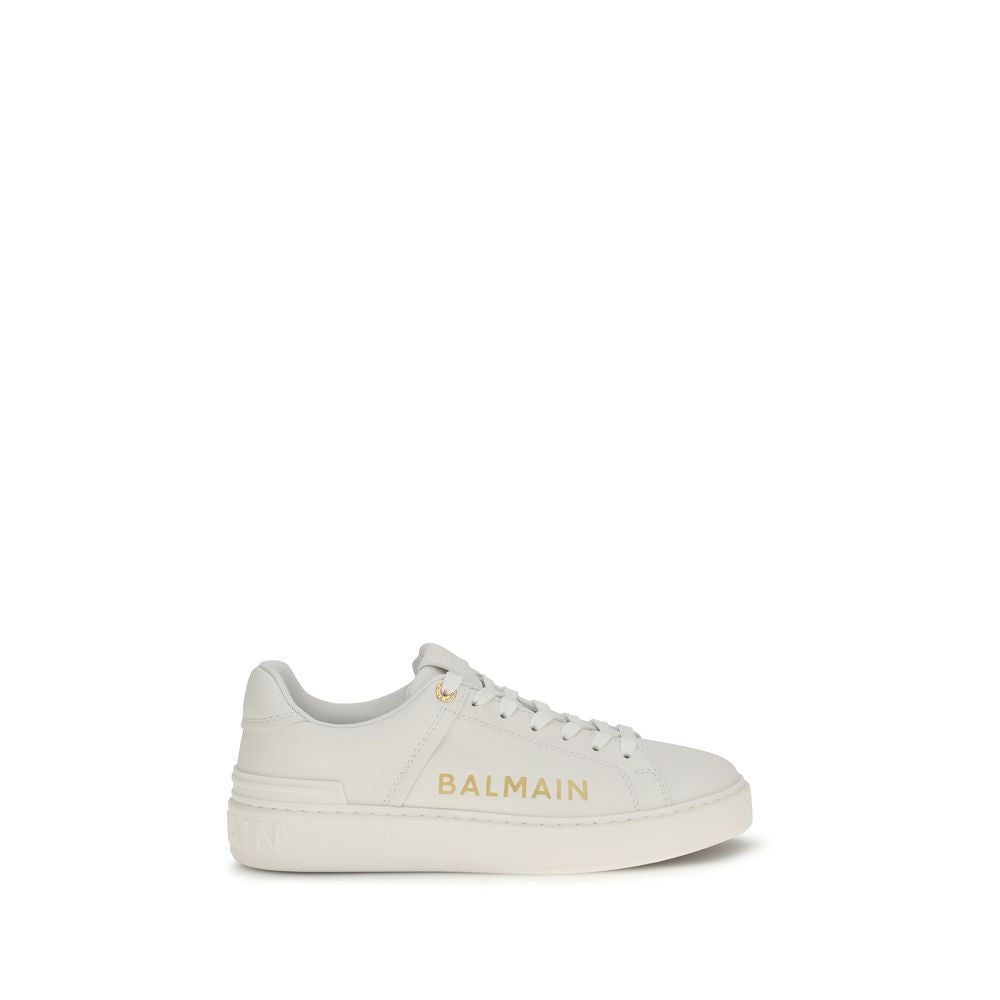 White calf leather Balmain Bos Taurus low top sneakers with sleek design and subtle branding.