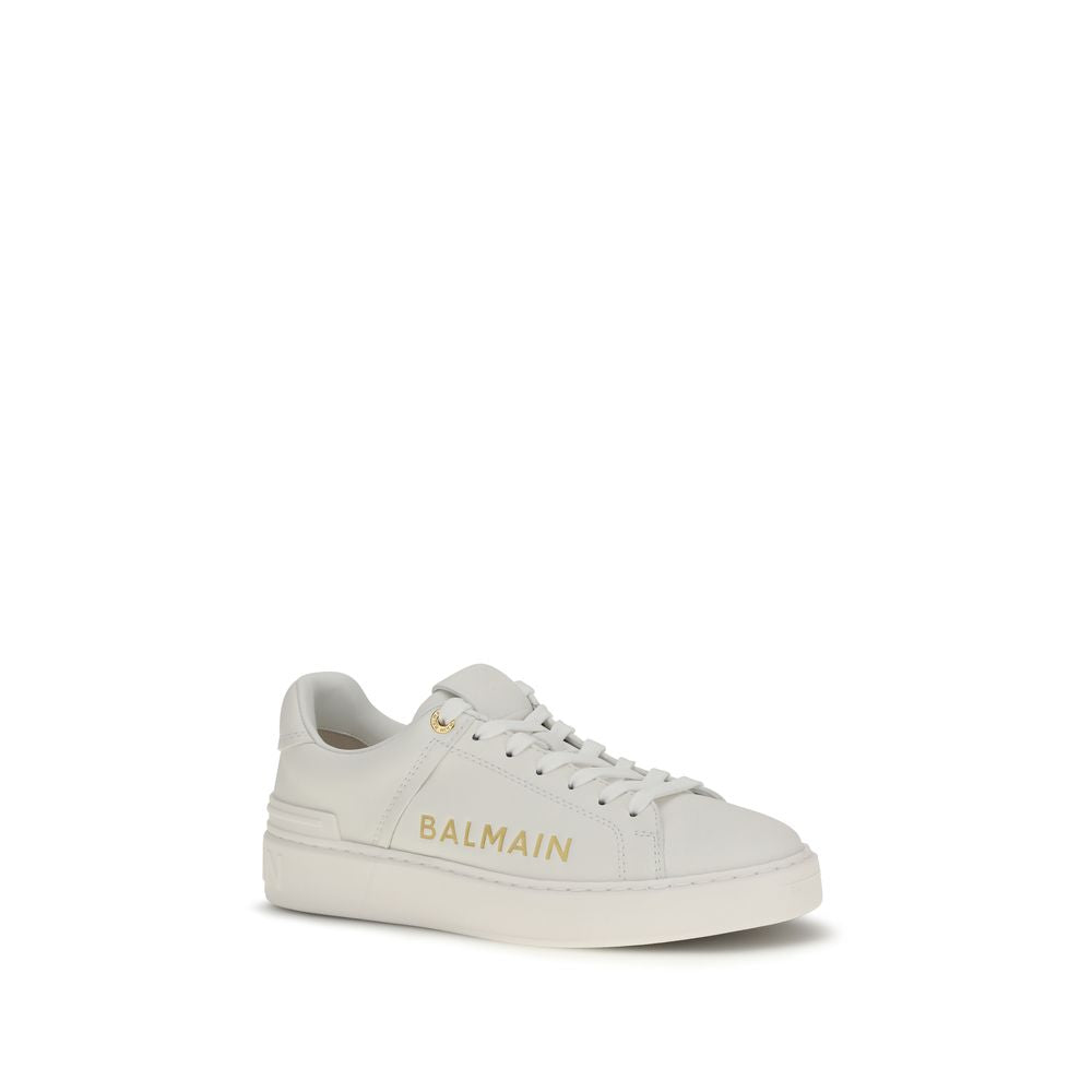 Balmain white calf leather Bos Taurus low top sneakers with sleek design and minimal branding.