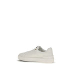 Balmain white calf leather Bos Taurus low top sneakers with sleek design and minimal branding on a plain background.