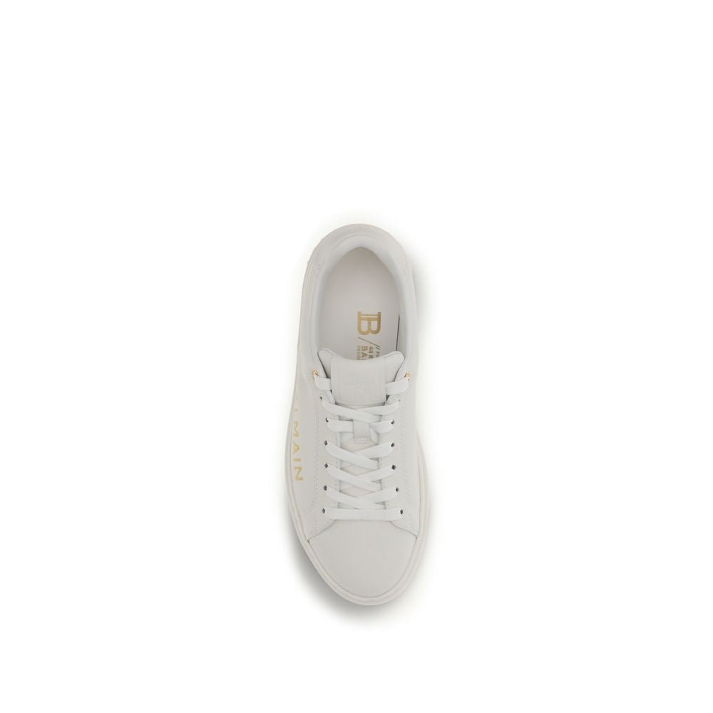 White calf leather Balmain Bos Taurus low top sneakers with sleek design and subtle branding.