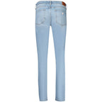 Light blue Guess Jeans Azzurro Lyocell women's skinny jeans shown on a model, highlighting slim fit and casual style.