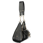 Black Guess Jeans polyurethane women's handbag with sleek design and silver hardware, featuring a structured shape and top handle.