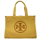 Yellow fabric shoulder bag by Tory Burch with a structured design and adjustable shoulder strap.
