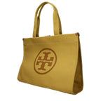 Tory Burch yellow fabric shoulder bag with adjustable strap and subtle logo detail, stylish and versatile for everyday use.