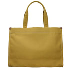 Yellow Tory Burch fabric shoulder bag with adjustable strap and subtle logo detail, perfect for casual or chic outfits.