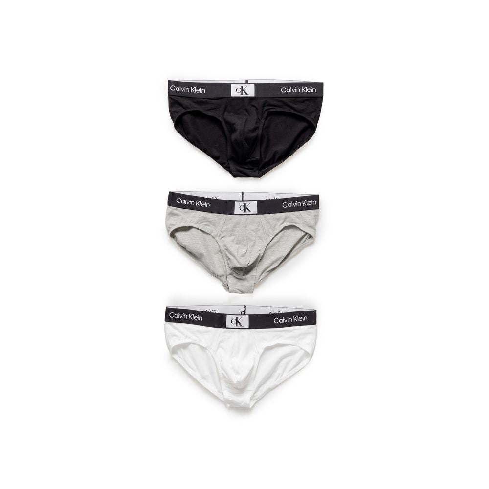 White cotton briefs from Calvin Klein Underwear with a classic fit and elastic waistband, shown laid flat on a neutral background.