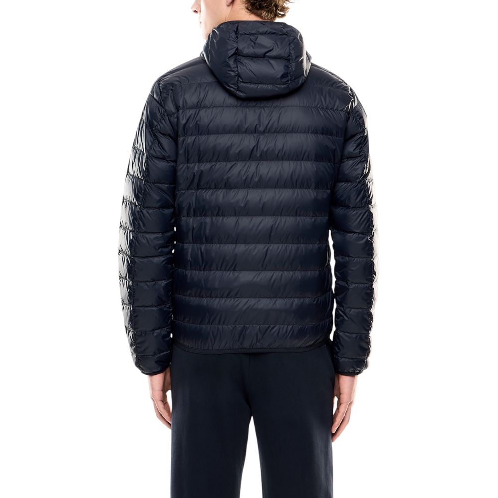 EA7 Emporio Armani blue polyamide shell jacket displayed on a hanger, showcasing its sleek design and lightweight material.